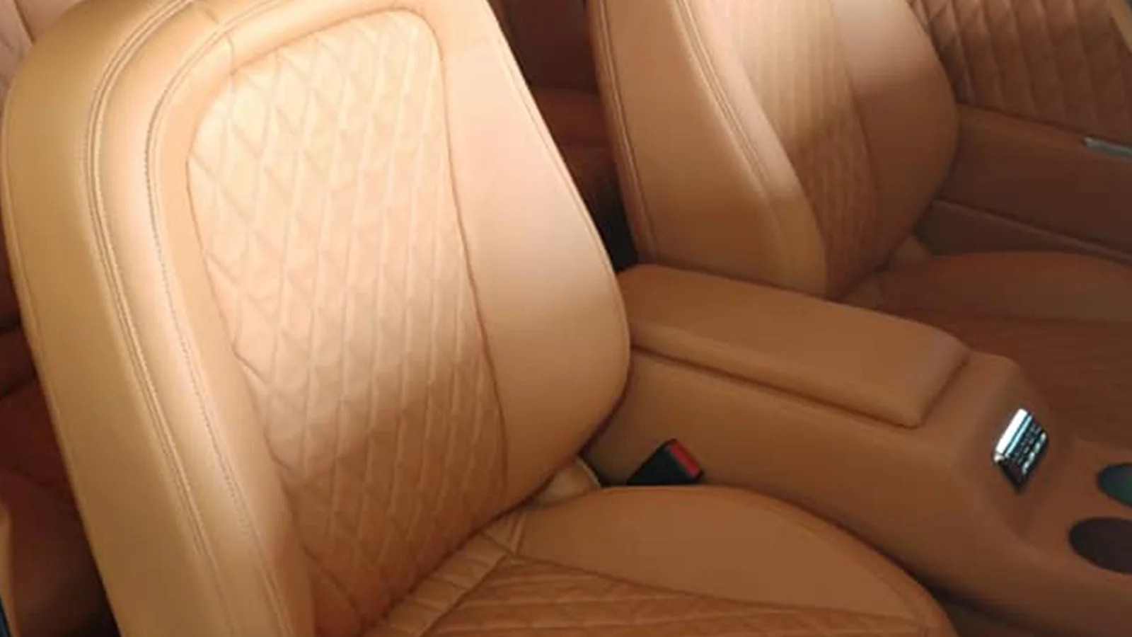 Tan diamond-stitched custom Camaro seats