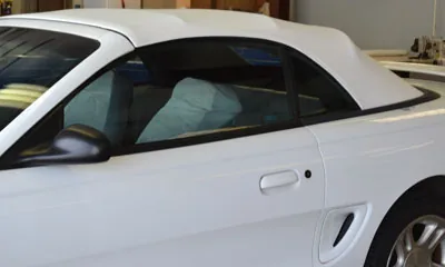 White convertible with a replacement top